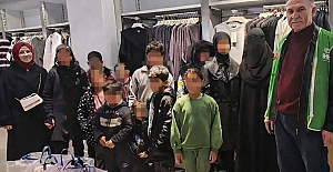 Çorum'da 41 yetimin yüzü giyim desteğiyle güldü