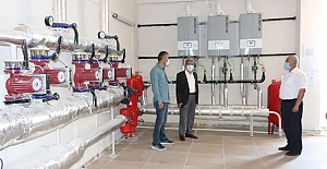 Doğalgaz dönüşümü yapılan okulları inceledi